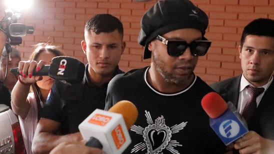 Paraguay police detain Ronaldinho, allege false passport