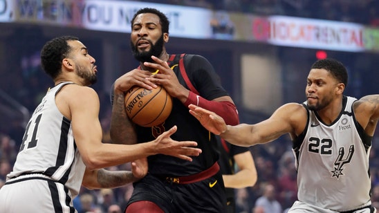 Drummond scores 28, Sexton 26 as Cavaliers down Spurs in OT