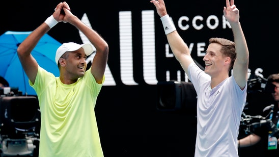 The Latest: Djokovic's tribute to Kobe after Australian win