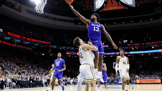 Powell leads No. 12 Seton Hall past No. 10 Villanova 70-64