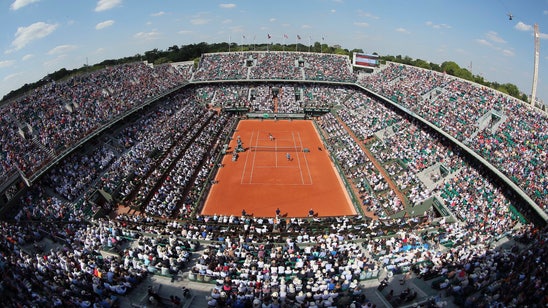 AP PHOTOS: The clay and the scenes from French Opens past
