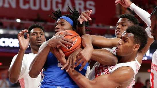 White, Grimes lead No. 21 Houston to 64-57 win over Memphis