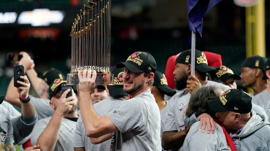 Scherzer, Nationals start quietly for World Series champions