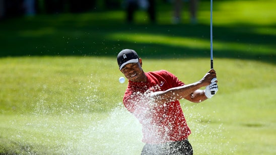 Fan sues Woods, caddie, claiming he was pushed 2 years ago
