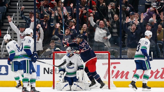 Blue Jackets rally past Canucks 5-3 to aid wild card push