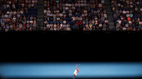 The Latest: Djokovic beats Federer, reaches Australian final