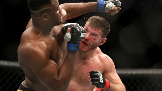 UFC champ Miocic welcomes octagon's return, has concerns