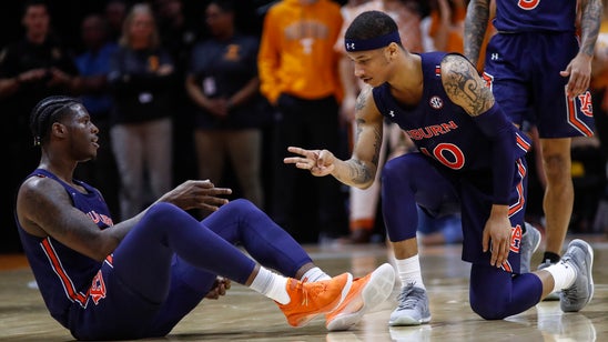 Doughty makes 8 3s as No. 17 Auburn beats Tennessee 85-63