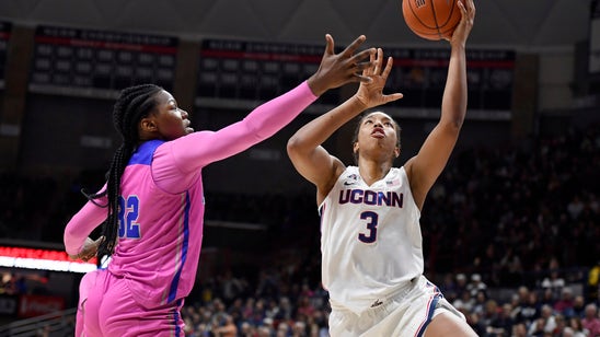 Walker leads No. 4 UConn to a bounce-back rout of Memphis