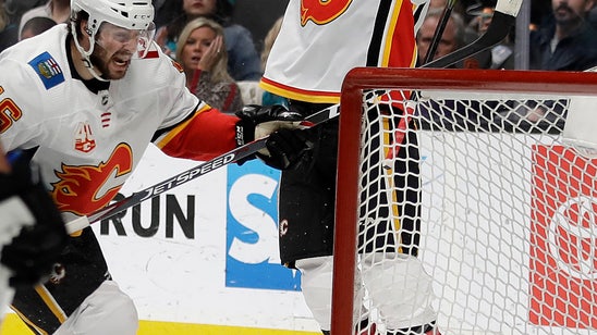 Flames use fast start to beat Sharks 6-2