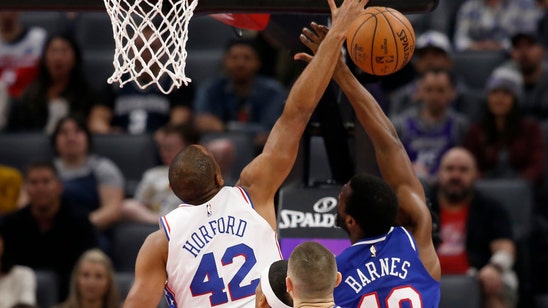 Harris scores 28 as Sixers beat Kings to end long road skid