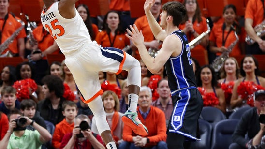 Huff plays huge as Virginia beats No. 7 Duke, 52-50
