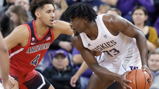 Baker's late 3 lifts Arizona past Washington 75-72