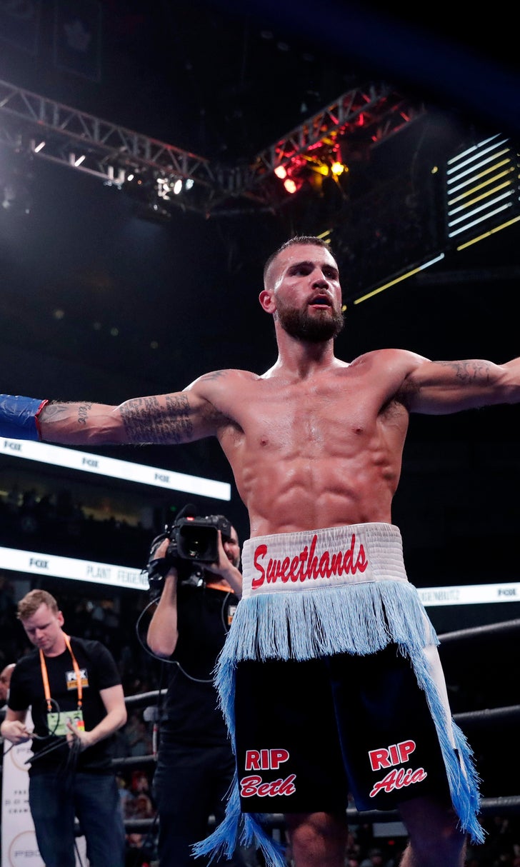 Tennessee boxer Plant defends world title with TKO in 10th
