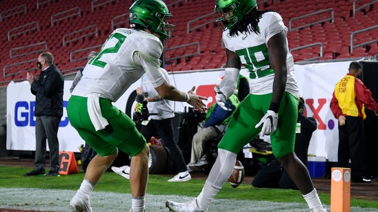 Oregon Holds Off USC For Pac-12 Title
