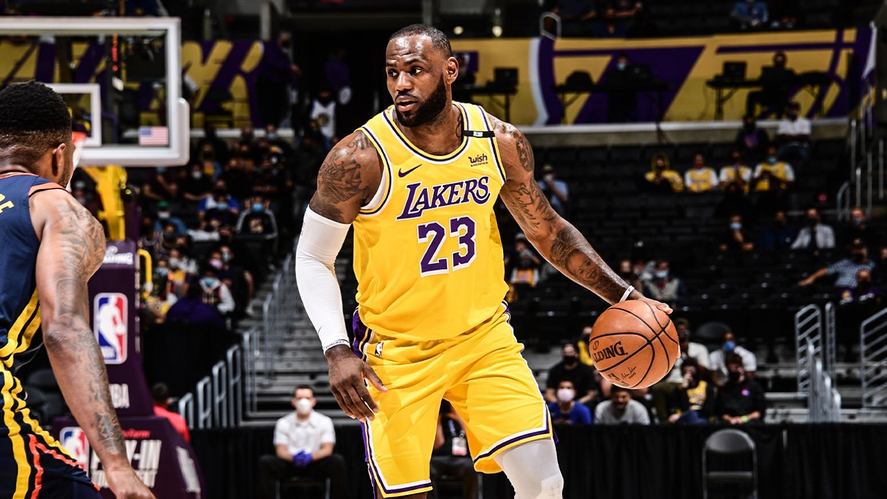 LeBron James' late 3 pushes the Lakers past the Warriors and into the 7-seed