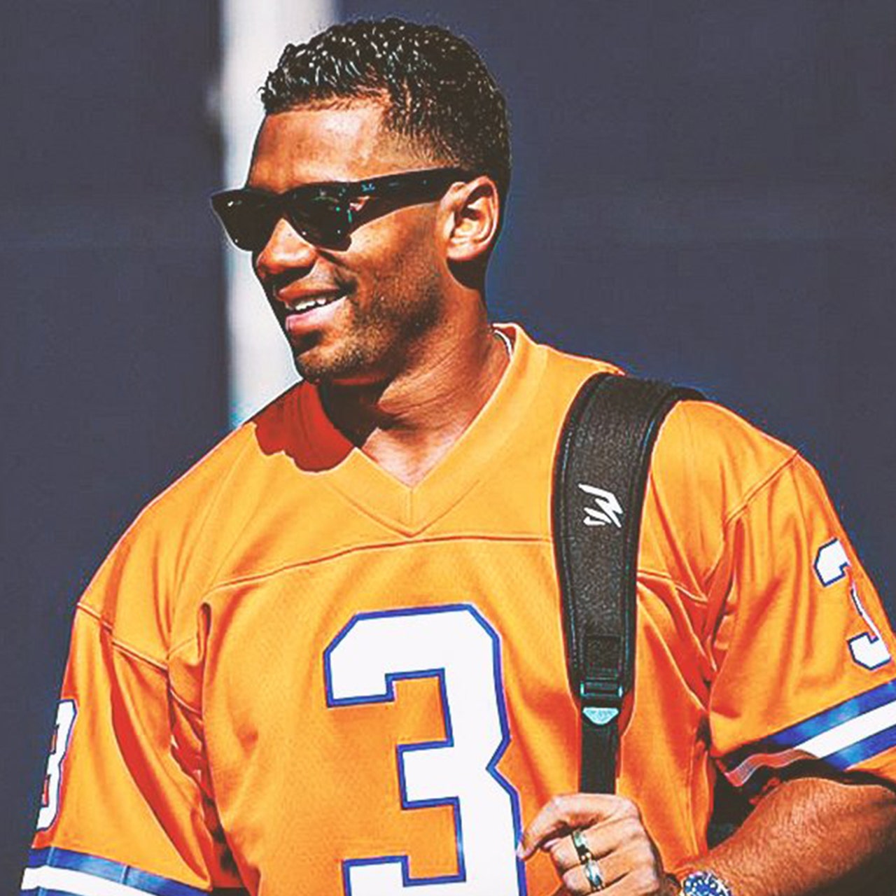 Russell Wilson boldly wears own jersey to camp