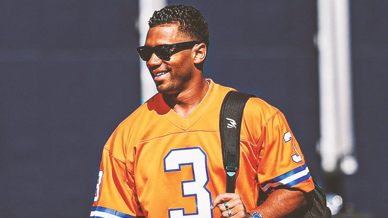 Russell Wilson boldly wears own jersey to camp