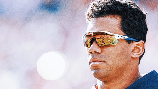 Russell Wilson takes fitness to new heights on London flight