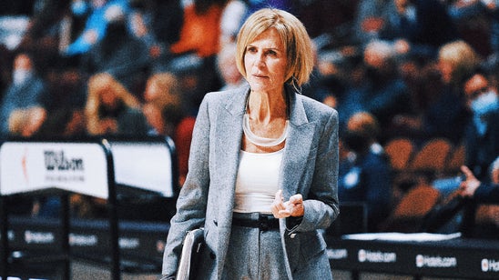 UConn associate coach Dailey leaves on stretcher before game