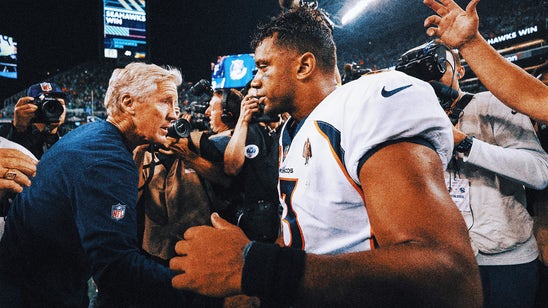Russell Wilson, Pete Carroll trade barbs over wristband use