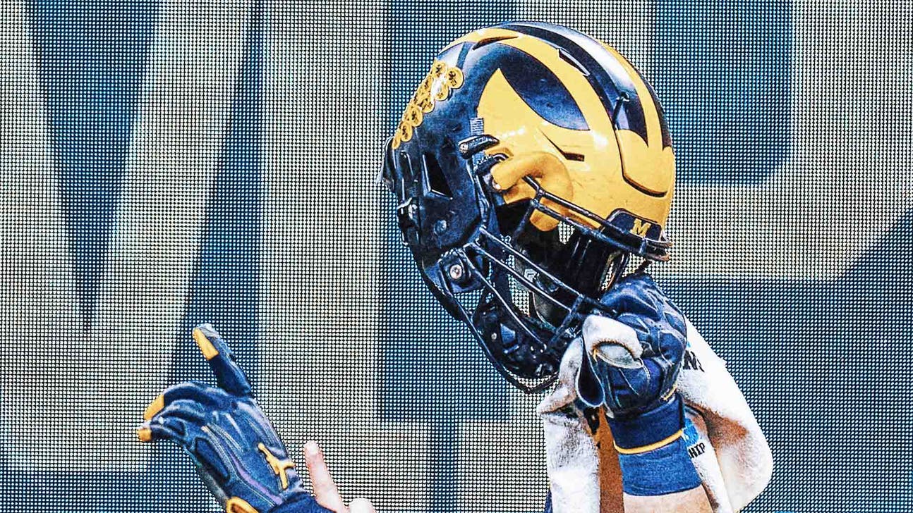 Michigan co-offensive coordinator Matt Weiss placed on leave