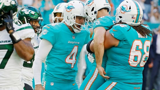 Dolphins squeak into final playoff spot with gutsy Week 18 win