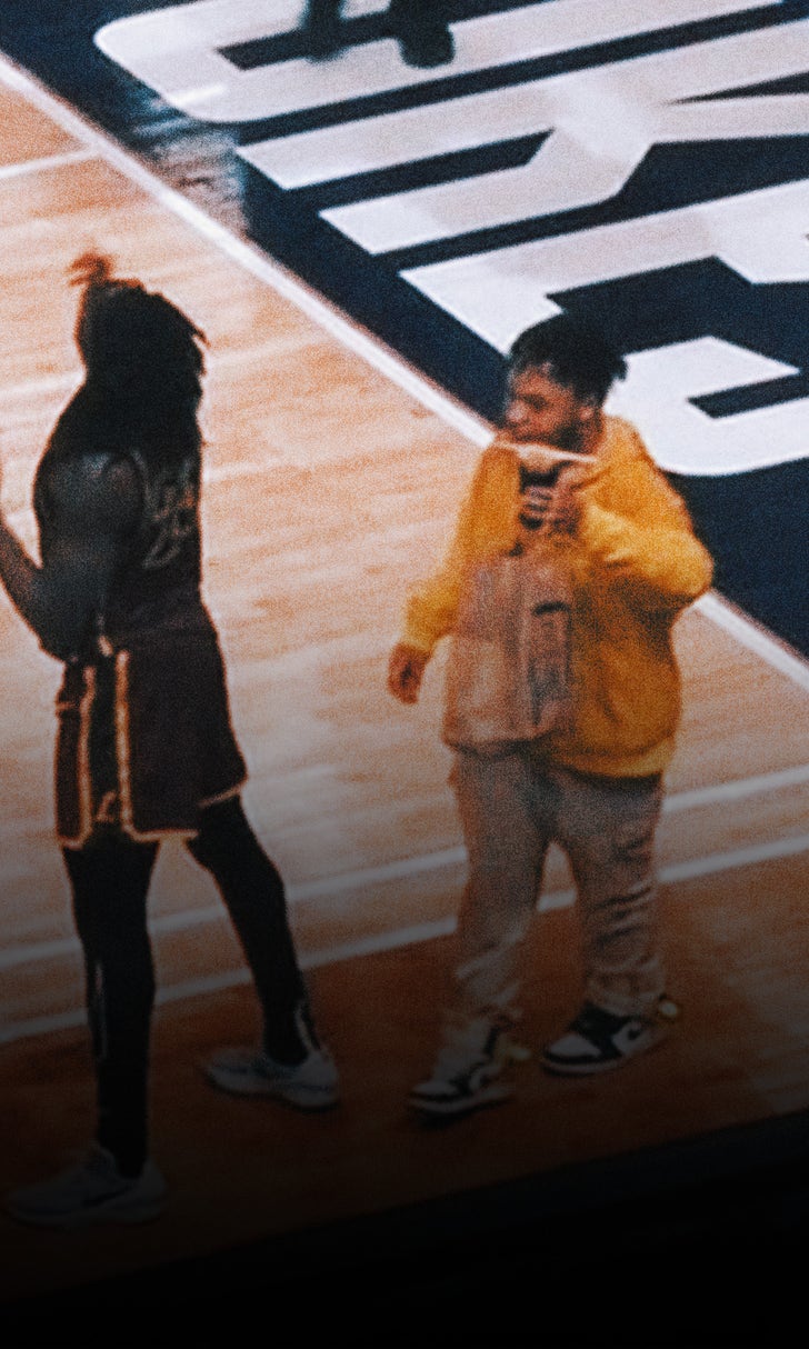 Food delivery guy walks onto court in middle of college basketball game