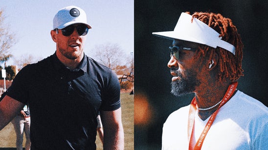 J.J. Watt gets assist from J.R. Smith after getting stuck in sand trap
