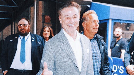 Rick Pitino's phone number leaked after cameras catch him giving it out at Knicks game