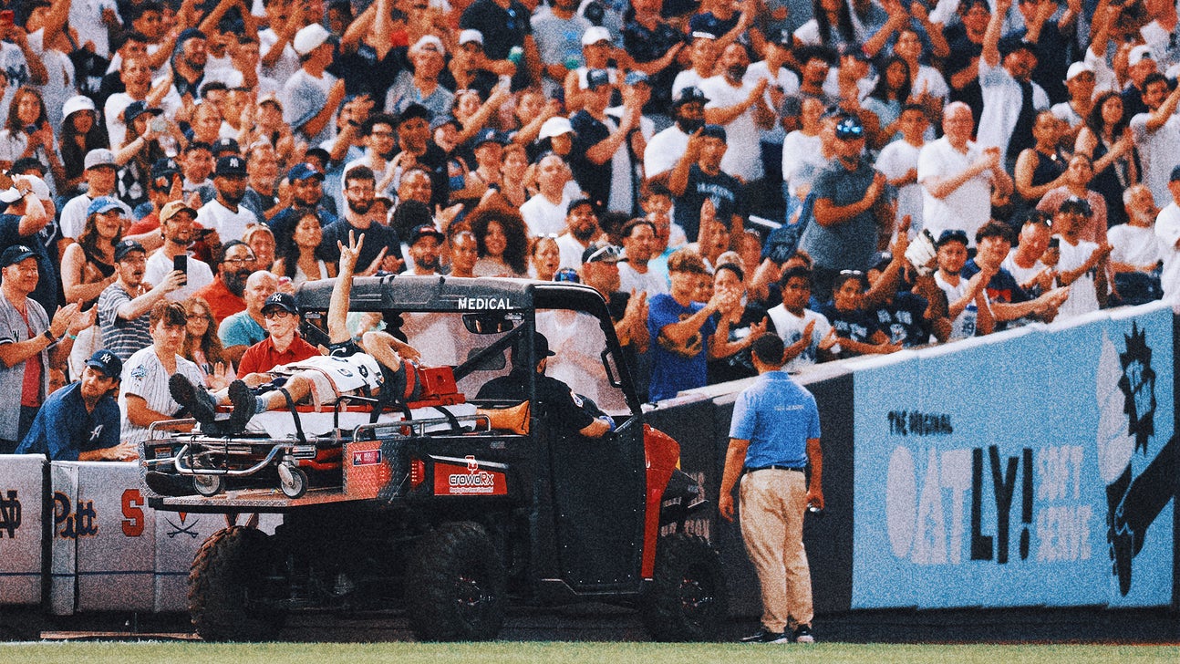 Cameraman injured at Yankee Stadium by wild throw has broken eye socket