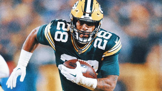 Packers' AJ Dillon focused after offseason in which he became an author and dad