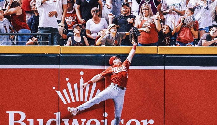MVP!' Fans serenade kid after he steals potential home run ball from Reds  OF