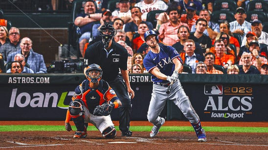 Rangers' bats finally erupt to stave off elimination against Astros