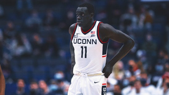 West Virginia forward Akok Akok released from hospital after collapsing on court