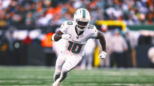 MIAMI DOLPHINS Trending Image: Tyreek Hill backflip celebration costs NFL cameraman his credentials