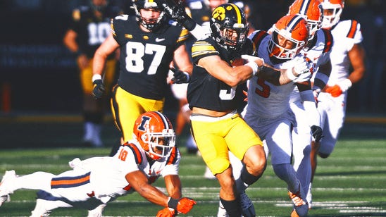 No. 16 Iowa rallies to defeat Illinois and clinch ticket to Big Ten title game