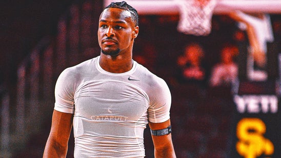 Bronny James mostly watches warmups with his No. 23 Southern California teammates