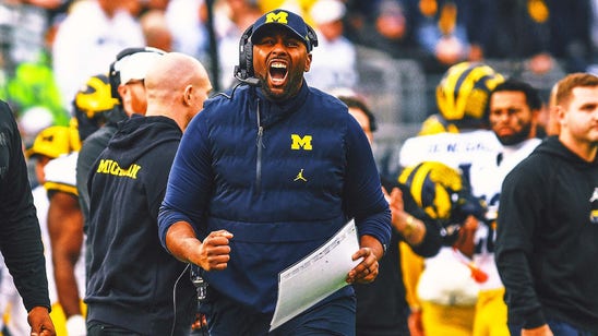 Michigan's Sherrone Moore emotional after win, says he won it for Jim Harbaugh