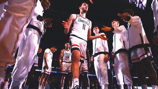 UConn unveils its 5th championship banner, routs Northern Arizona 95-52 in season opener