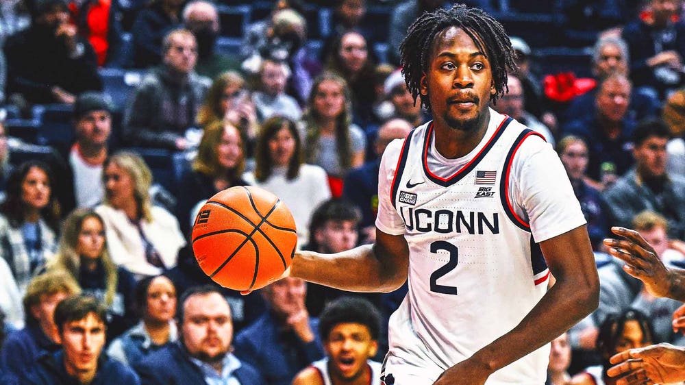 Short-handed UConn holds off St. John's in Big East home opener