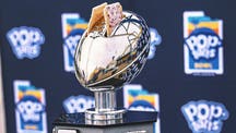 TENNESSEE VOLUNTEERS Trending Image: Pop-Tarts Bowl trophy and other college football bowl game oddities