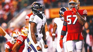 NFL Trending Image: Lamar Jackson leads the Ravens past the 49ers 33-19 in a showdown of the top 2 teams