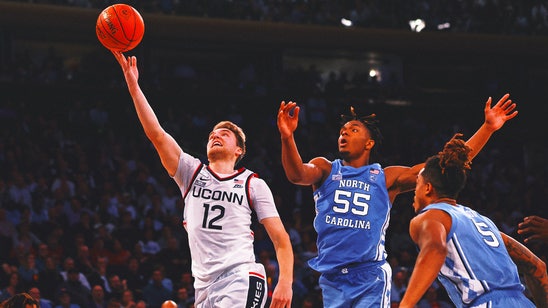 Spencer scores 23 to lead No. 5 UConn past No. 9 North Carolina 87-76 in Jimmy V Classic at MSG
