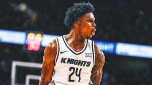COLLEGE BASKETBALL Trending Image: UCF Knights' defense powers team to comeback victory over No. 3 Kansas Jayhawks