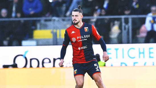 Tottenham signs Romania defender Radu Dragusin from Genoa