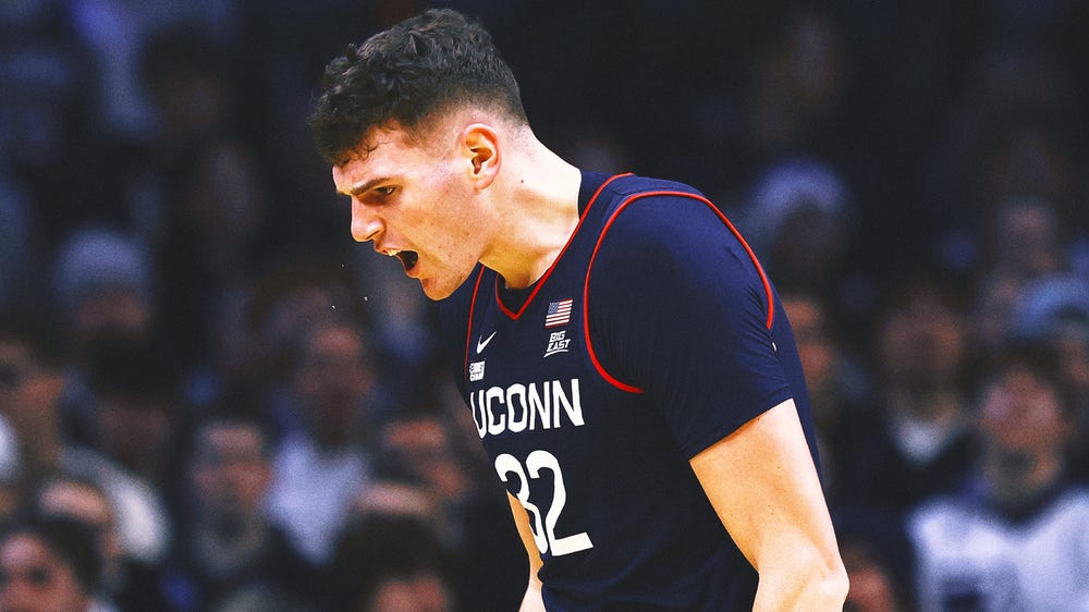 Donovan Clingan leads top-ranked UConn to its 11th straight win, 71-62 over Butler
