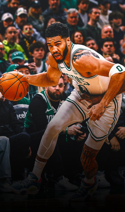 Jayson Tatum's triple-double leads Celtics past Heat 114-94 in playoff opener