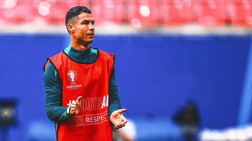 EURO CUP Trending Image: Portugal coach Martinez defends usage of Ronaldo, says he 'deserves' to be with national team