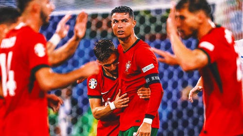 Imagem de tendência da EURO CUP: Cristiano Ronaldo acabou de evitar ser atropelado por torcedor que pulou da torcida na Euro
